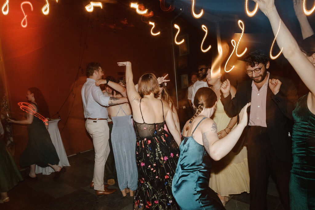 Authentic, candid Vermont wedding photography capturing laughter and connection.